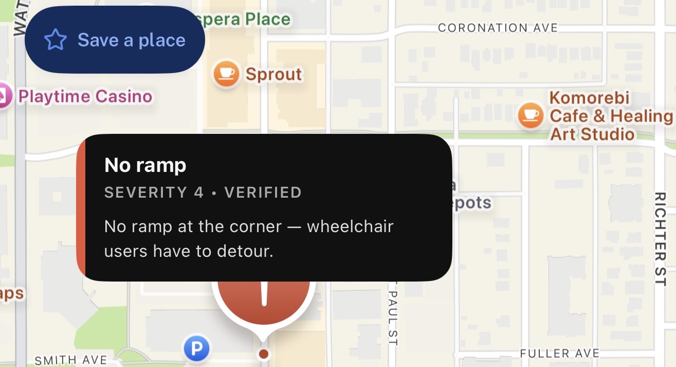 AccessMap's map with a verified 'No ramp' barrier flagged at a downtown Kelowna corner — wheelchair users have to detour